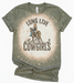 Green t-shirt with a graphic design of a cowgirl on a horse and text 'Long Live Cowgirls' on a white background.