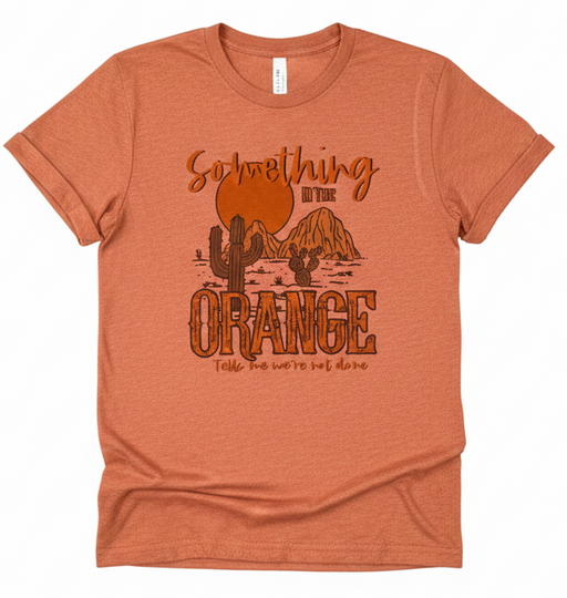 Orange t-shirt with a graphic design and text on a white background