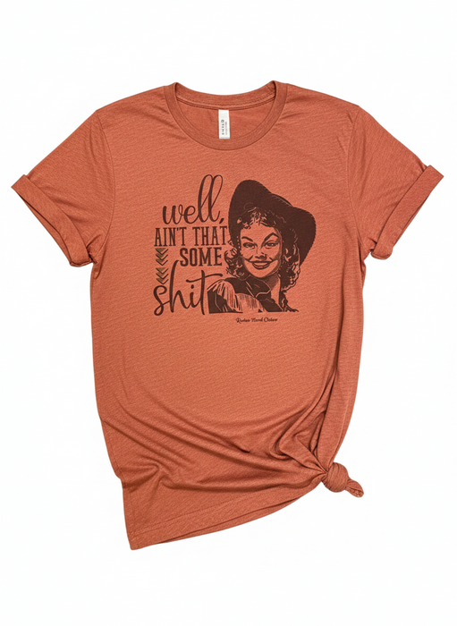 "Well, Ain't That Some Sh*t" Retro Cowgirl Tee | Bella + Canvas 3001 Heather Clay Unisex T-Shirt | Funny Vintage Western Graphic | Sassy Boutique Country Top